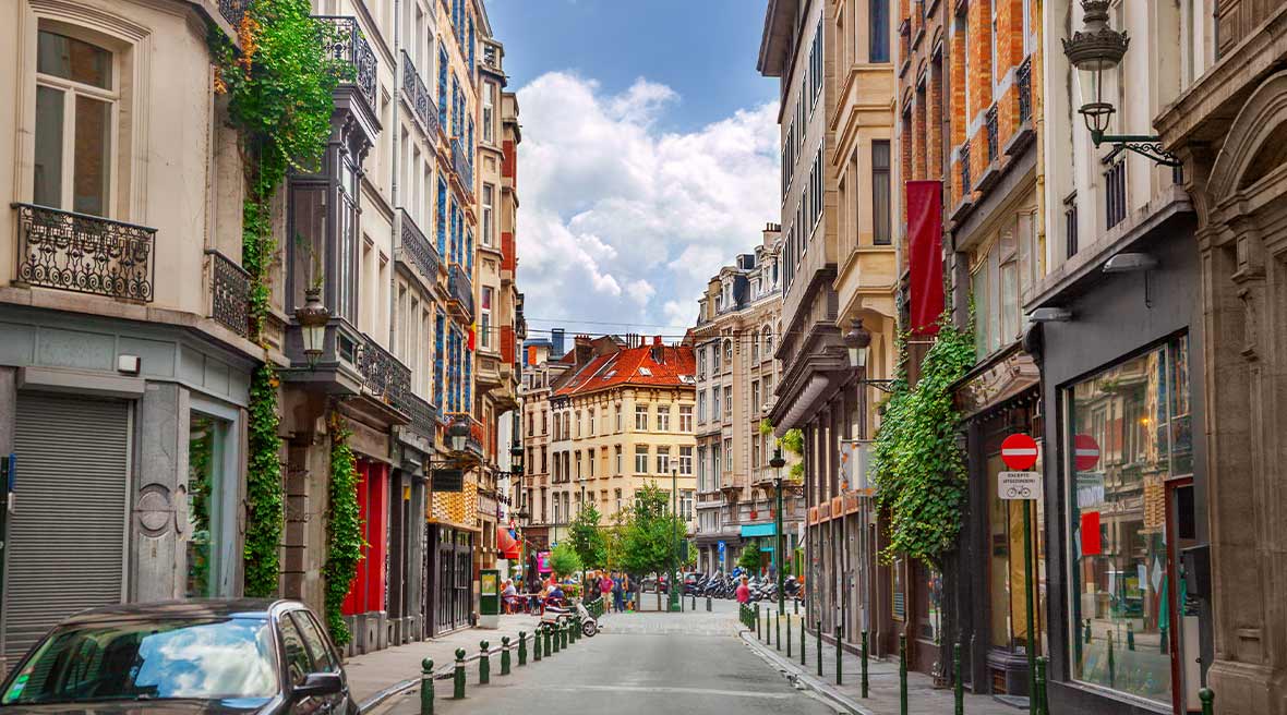 Street in Brussels lined with shops and restaurants